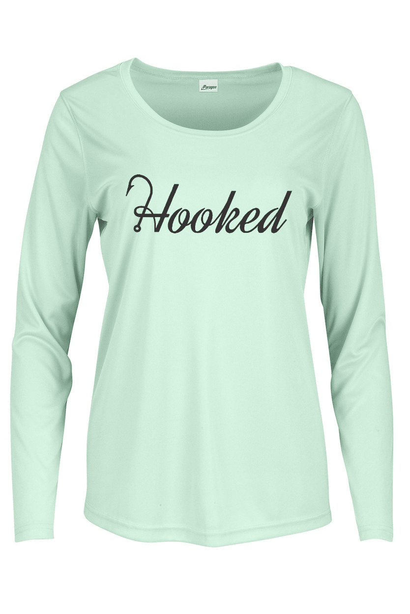 Angler wearing Hooked Fishing long sleeve shirt for women
